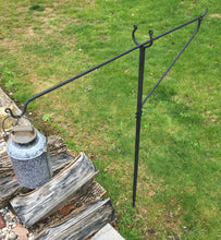 The durable three-piece stake design allows you to take your campfire pot dangler anywhere for your cookouts. Simply hang or dangle your coffee pot or Dutch oven to heat quickly and easily. The iron is hand-forged and textured with a black matte high-temp