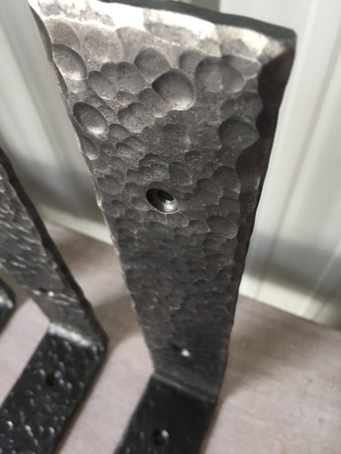 Custom Made by Mitty's Metal Art - www.mittysmetalart.com - These metal shelf brackets are individually hand-forged, shaped and textured. 