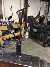 Mitty's Metal Art by Ryan Schmidt - www.mittysmetalart.com - This calla lily is maintenance free and blooms all year round! The handcrafted, using blacksmith and other metalsmithing techniques, is finished with a clear coat to showcase the natural beauty 
