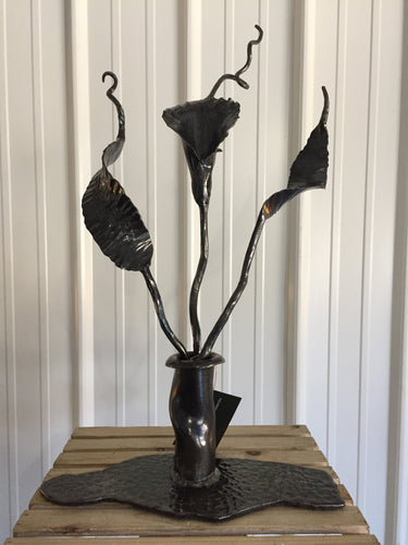 Mitty's Metal Art by Ryan Schmidt - www.mittysmetalart.com - This calla lily is maintenance free and blooms all year round! The handcrafted, using blacksmith and other metalsmithing techniques, is finished with a clear coat to showcase the natural beauty 