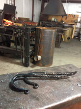 We’re all about using the wall for vertical storage! Blacksmith Metal Art by Ryan Schmidt - www.mittysmetalart.com - Shop Online Anytime!
