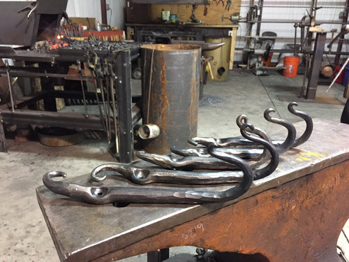 We’re all about using the wall for vertical storage! Blacksmith Metal Art by Ryan Schmidt - www.mittysmetalart.com - Shop Online Anytime!